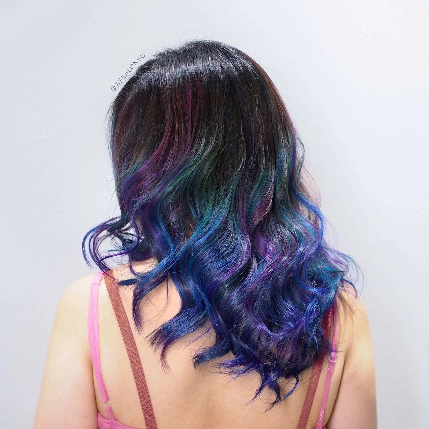7. Precious Gems Balayage The unicorn colours does not have to be brightly dyed on your full head of hair. Go subtle with just dimmed rainbow colours and a balayage that blends nicely into your natural dark hair. This look is also suitable for ladies who want unicorn hair colour with minimal hair damage. These jewel tones will make you look so precious.